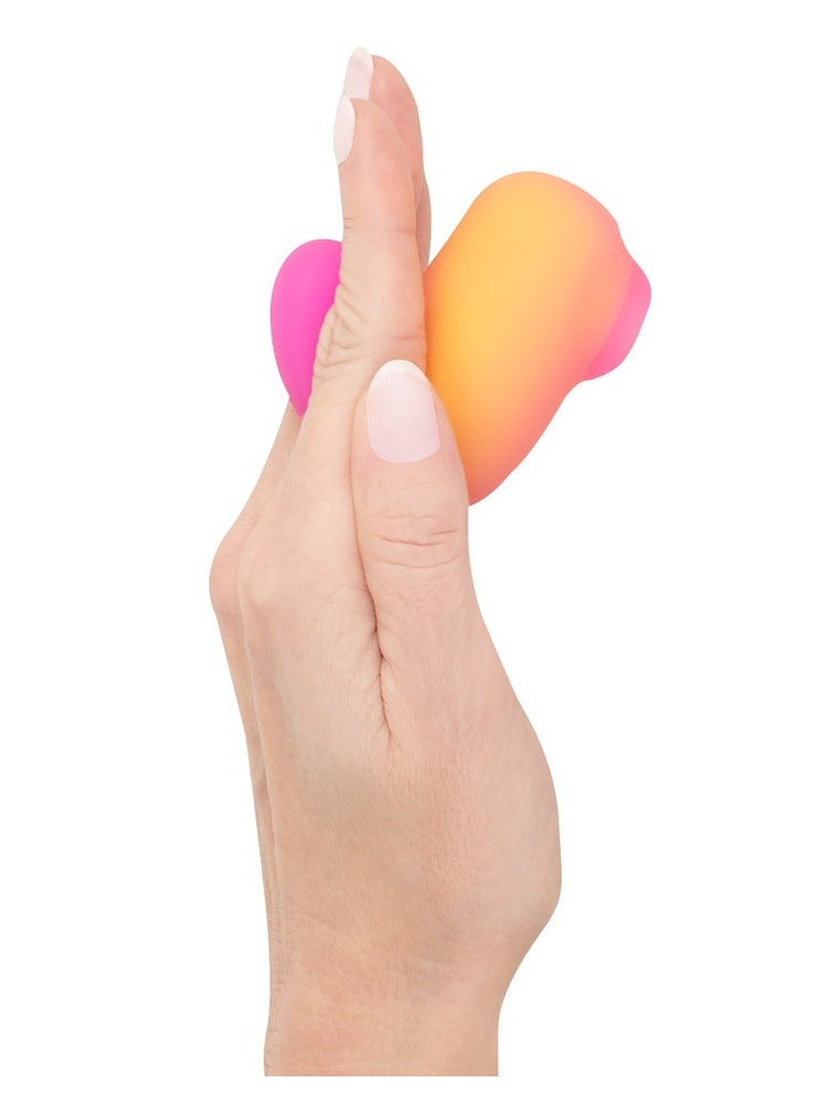 Hånd som holder ROMP Kiss, som viser ergonomisk grep.
