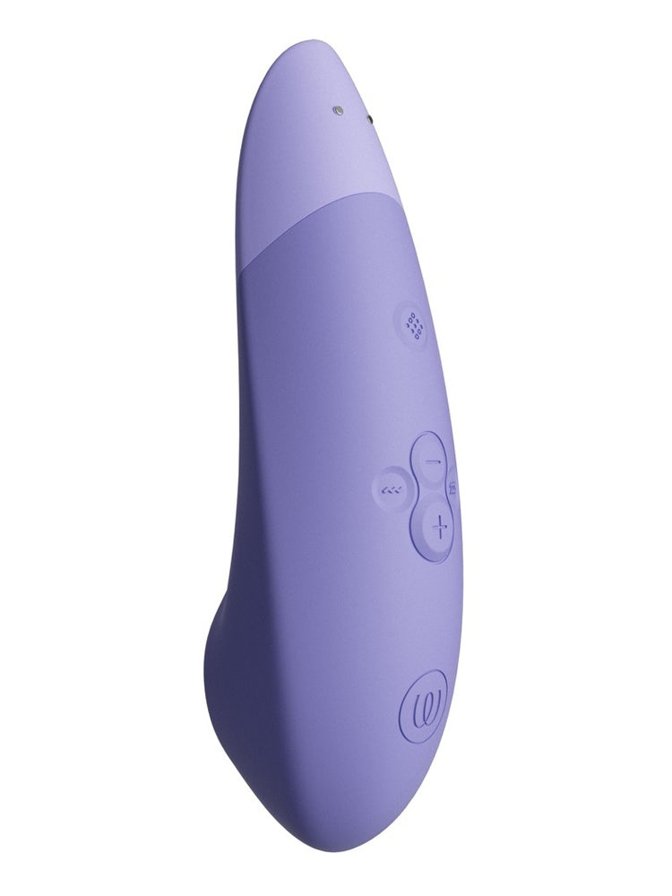Womanizer Enhance i lilla, sett fra siden med synlige kontrollknapper.