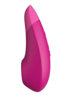 Womanizer Enhance i rosa, sideprofil med synlige kontrollknapper.