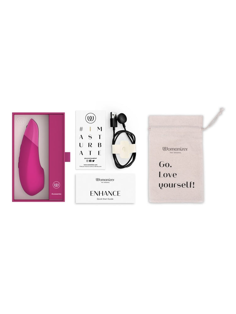 Innhold i pakken: Womanizer Enhance, ladekabel, bruksanvisning og oppbevaringspose.
