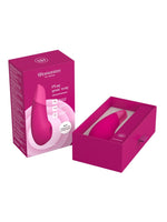 Emballasje og åpen eske med produktet i rosa.