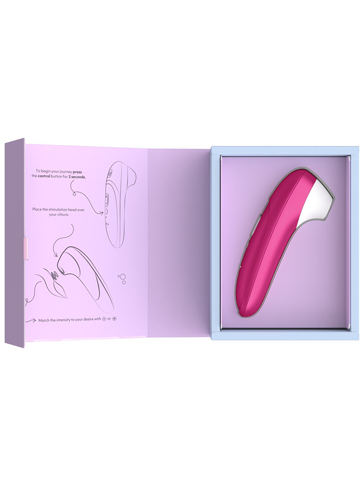 Rosa klitoris stimulator i gaveeske, sexleketøy for kvinner, liggende i åpen eske med bruksanvisning