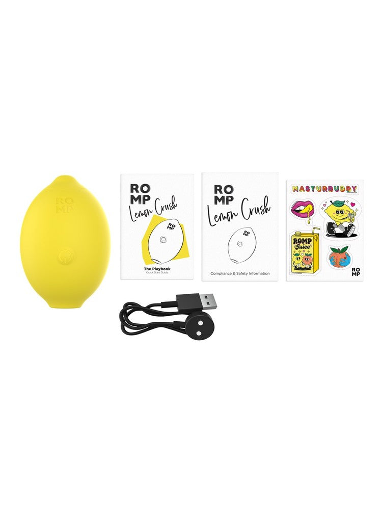 ROMP Lemon Crush – innhold i esken: klitorisstimulator, magnetisk USB-kabel, hurtigstartguide og klistremerker