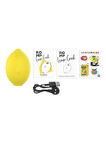 ROMP Lemon Crush – innhold i esken: klitorisstimulator, magnetisk USB-kabel, hurtigstartguide og klistremerker