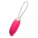 Pink wireless vibrating egg with gold accent and looped retrieval cord on white background