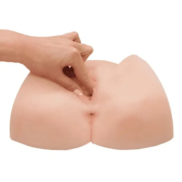Realistic silicone torso adult toy with hand demonstrating texture