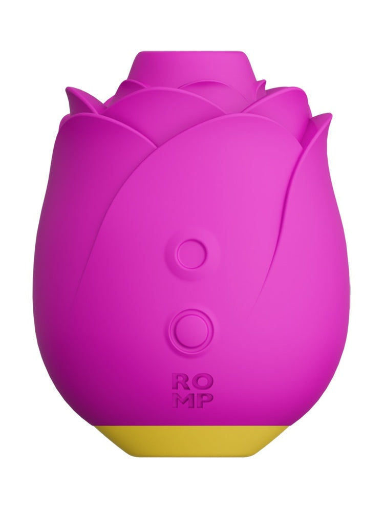 ROMP Rose klitorisstimulator i magenta, sett forfra med rosenform, av/på-knapp og logo.