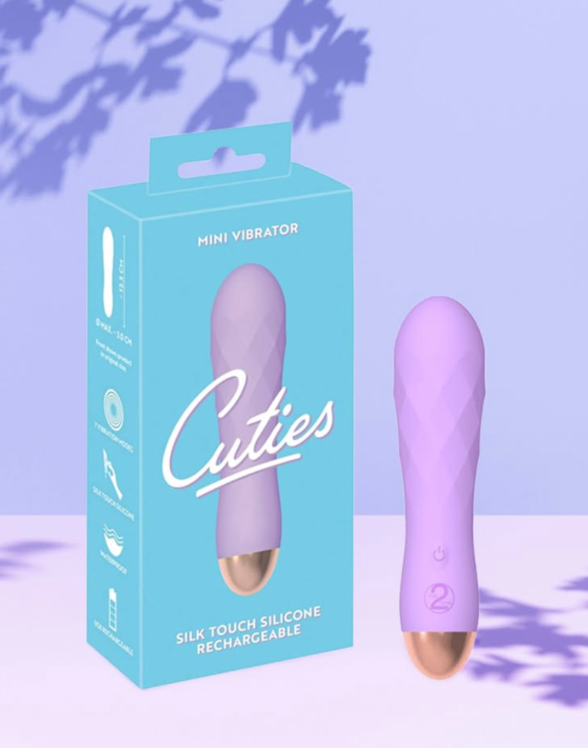 Lilla mini-vibrator med emballasje.
